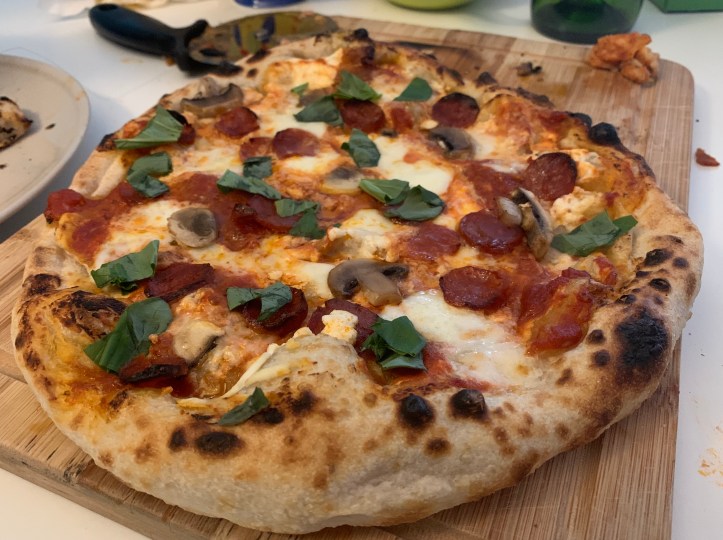 a pizza with home grown herbs 