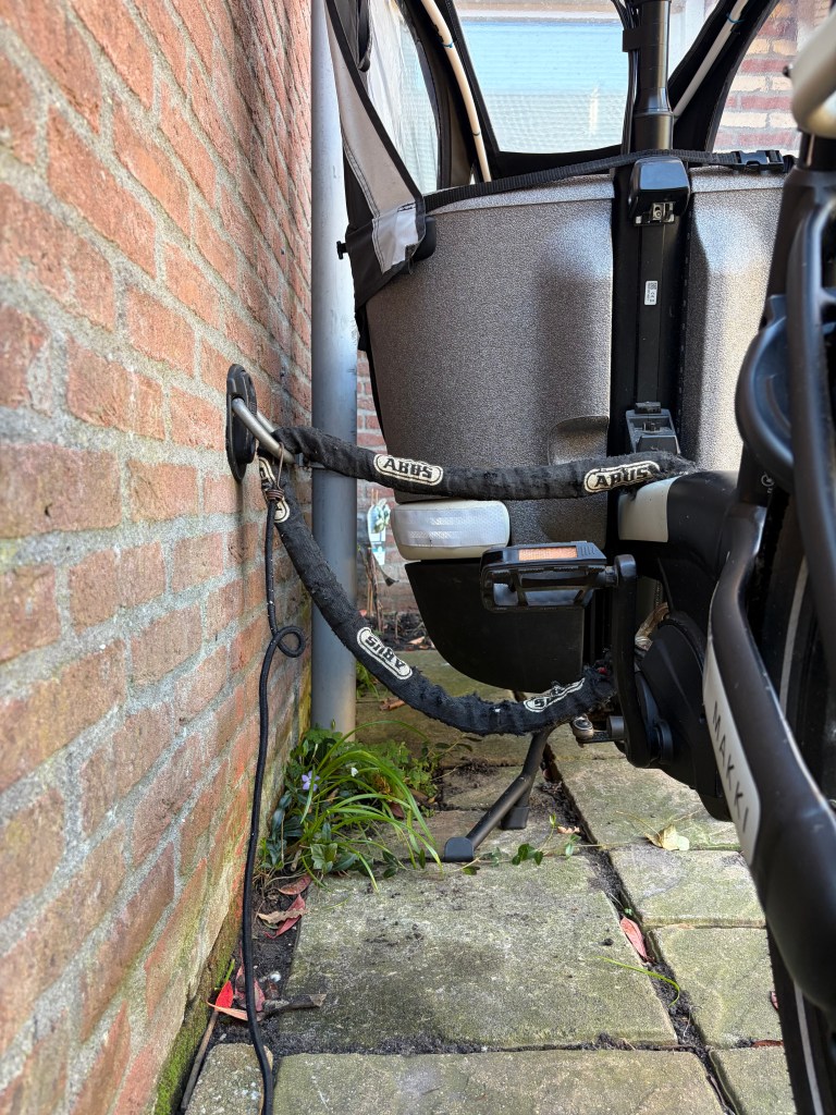 The parked bike and the green edge